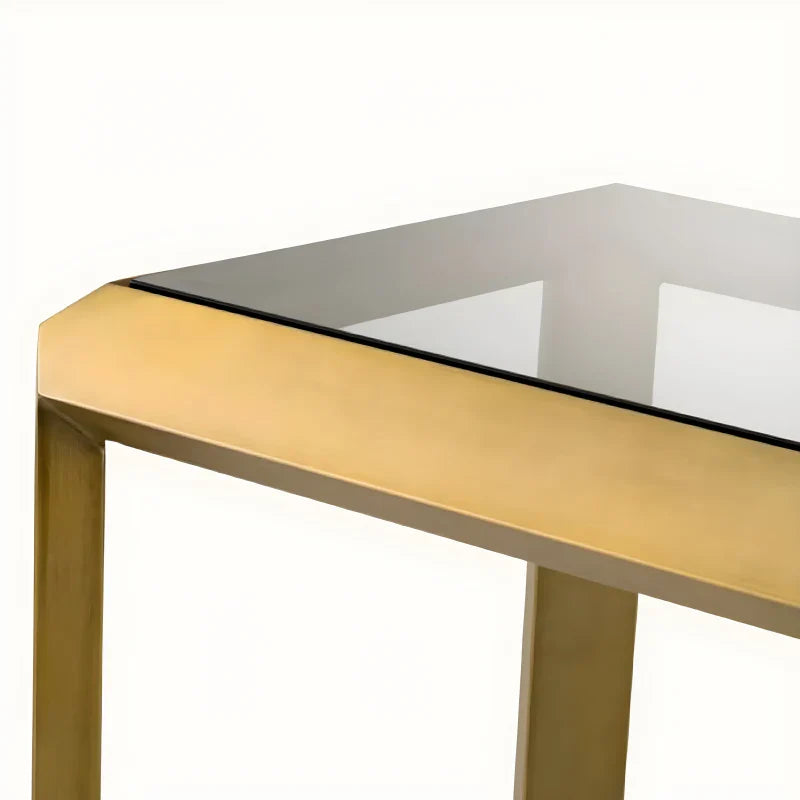 Console dorée en verre fumé