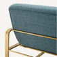 Fauteuil en tissu bleu mer