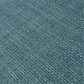 Fauteuil en tissu bleu mer
